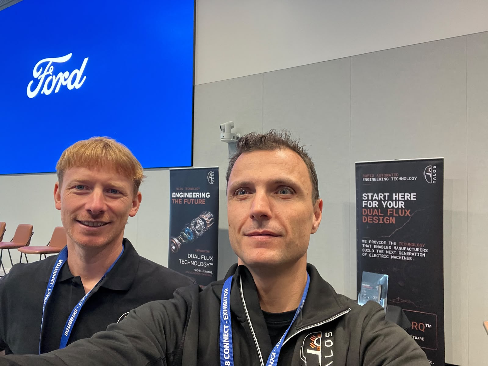 Two Talos Technology team members at the Talos stand at Ford HQ in Dearborn